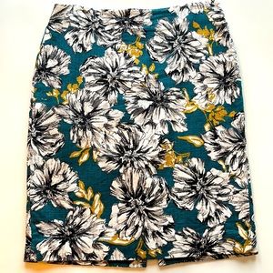 Ann Taylor pencil skirt. Colors: teal, gold, black and white. Size 12.